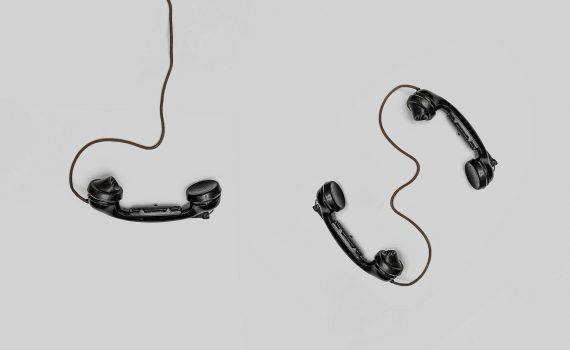 three black handset toys