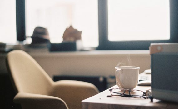 coffee cup and glasses on a table