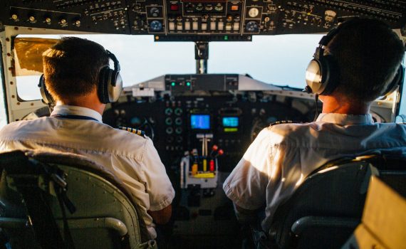 two pilots flying an airplane